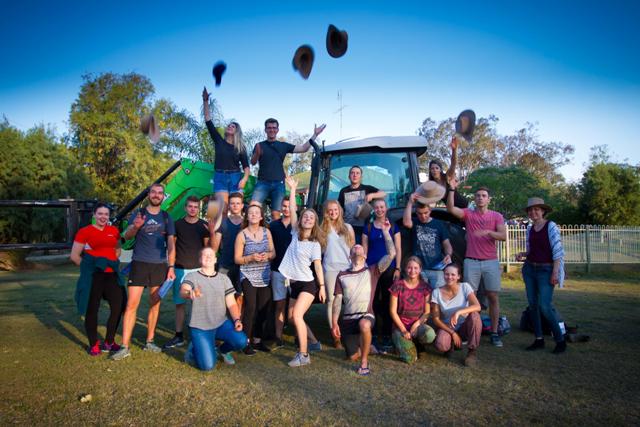 Group celebrating completion of outback training programme 