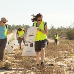 Volunteers collecting rubbish from a beach site in Western Australia 