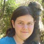 Oyster volunteer receiving love from a baboon