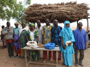 Project leaders display unprocessed tree products