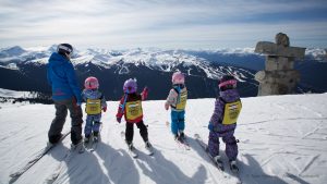 Whistler Kids with Inukshuk in background