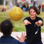 A volunteer in South Africa coaches netball in the townships