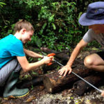 Volunteers help to make enrichments in Borneo
