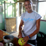 A volunteer creates enrichments for animals at the sanctuary