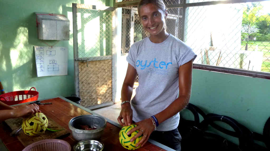 A volunteer creates enrichments for animals at the sanctuary