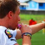 Coach blowing a whistle
