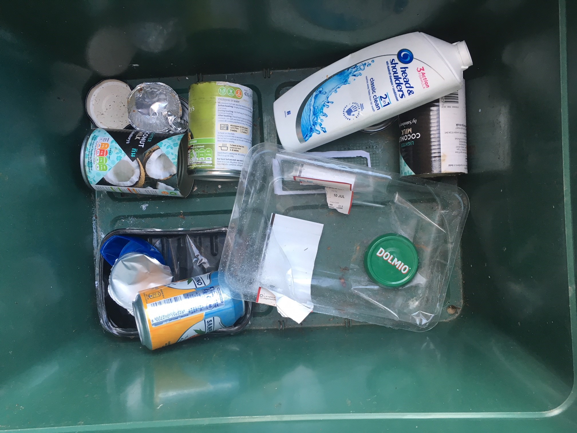 Lack of plastic in a recycling bin 