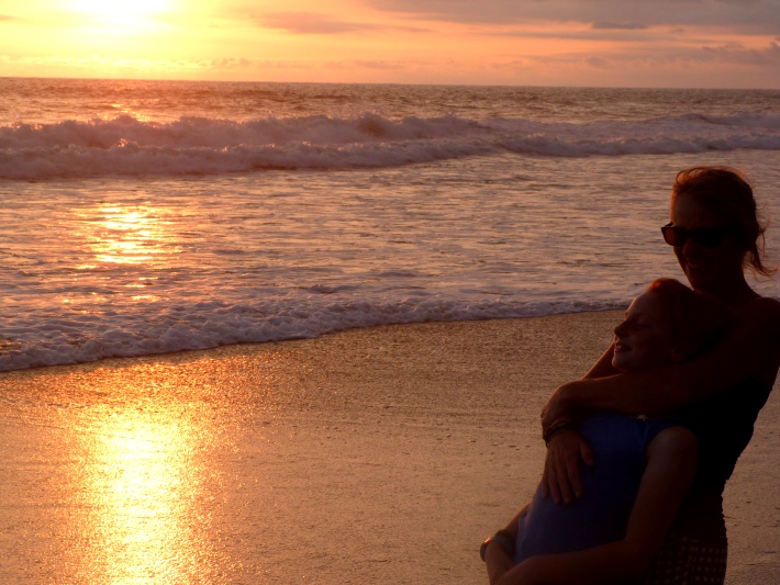 Family holidays will never be the same again if you choose to volunteer together. A mother and daughter at the beach on a turtle conservation project in Costa Rica