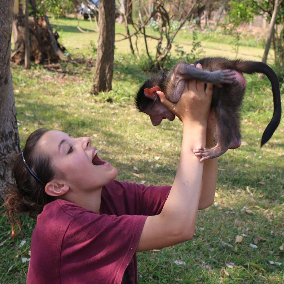 Oyster volunteer with monkey in South Africa