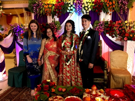 An Oyster volunteer in Nepal attends a Nepali wedding, dressed in local clothing to be culturally sensitive