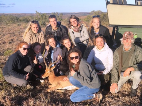 group photo of the verterinary volunteers in South africa with Oyster