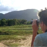 Volunteer spots elephants in the wild in Sri Lanka