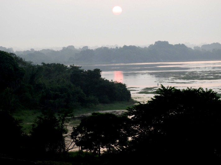 Here is one great reason to visit Sri Lanka - the sun sets over a beautiful mountain scenery in Sri Lanka