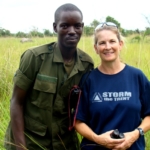 Mandy and a ranger out on the monitoring duty on the volunteer and safari project in Uganda