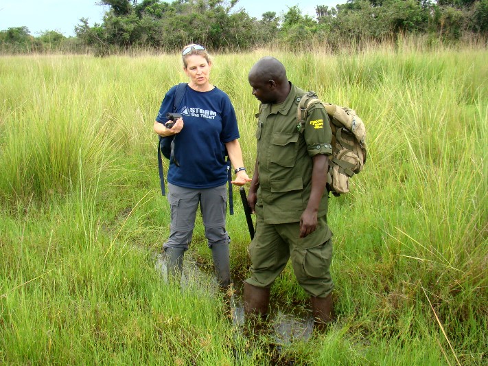 Mandy and one of the rangers track the rhinos