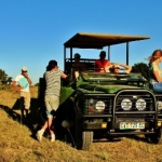 Volunteers on jeep patrol at Kwantu game reserve, South Africa