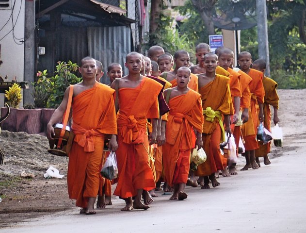 Monks collecting alms