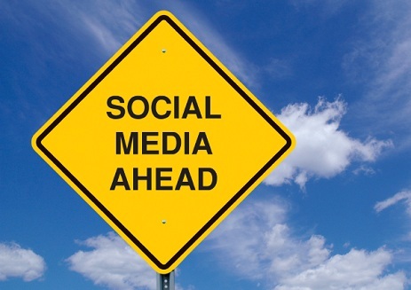 Road sign with sky backdrop reading Social Media Ahead